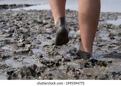 Girl Bare Foot On Mudflat Fun Activity