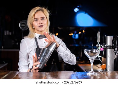 Girl Barman Makes A Cocktail In The Beerhouse