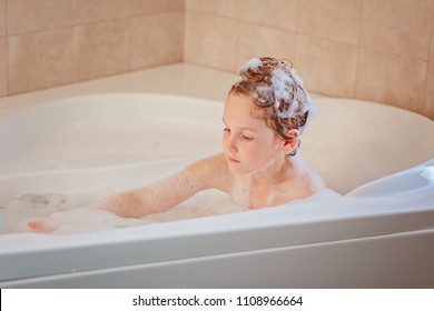 nude woman in a bath. copy space..