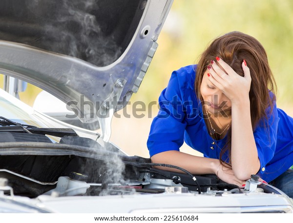  girl with\
beautiful hair and broken down\
car