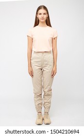 Girl In Beige Cargo Pants And A T-shirt