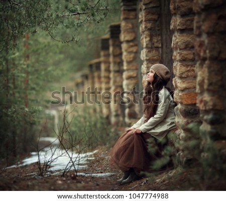 girl in a beret in the spring