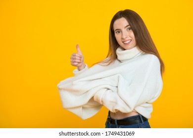 Girl In Too Big Sweater After Losing Weight. The Concept Of Healthy Eating