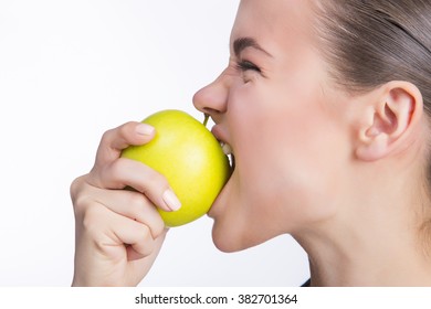 Girl bites apple
