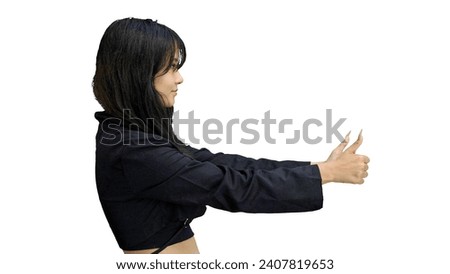 A girl in black clothes, on a white background, close-up, shows her thumbs up