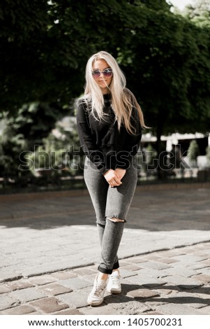 Similar – fashion autumn portrait of young happy woman walking outdoor