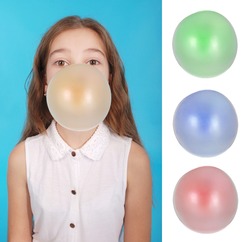 Person doing bubble with chewing gum on bright background People Images