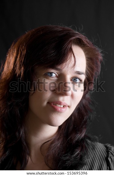 Girl Blue Eyes On Dark Background Stock Photo Edit Now