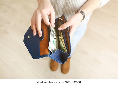 Girl With Blue Wallet Full Of Money