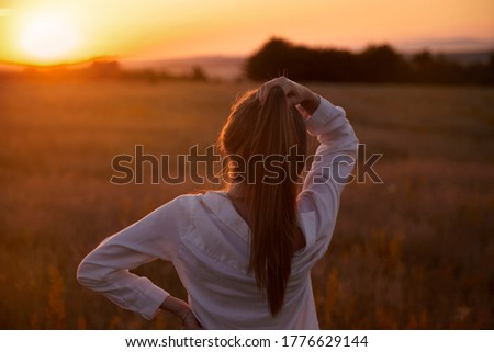 Similar – Image, Stock Photo Woman, both hands in the hair, back view