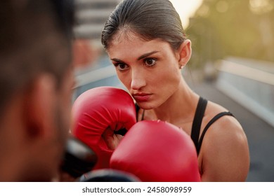 Girl, boxing gloves and outdoor for training, mentor and female boxer or athlete, road and fitness. Exercise, wellness and sports for martial arts, trainer and work out in cardio, workout and coach - Powered by Shutterstock