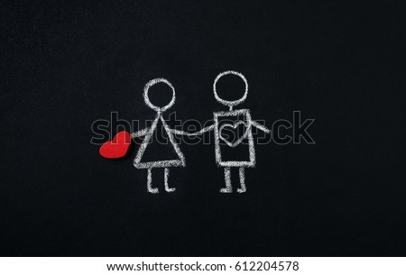 A girl and a boy drawn on a blackboard representing deceiving love