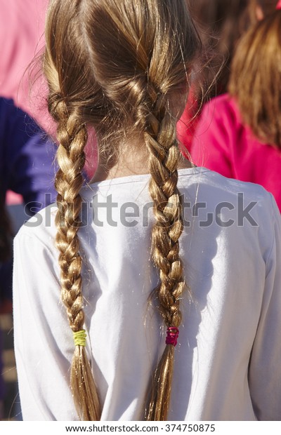 Girl Braids On Her Back Outdoors Stock Photo Edit Now