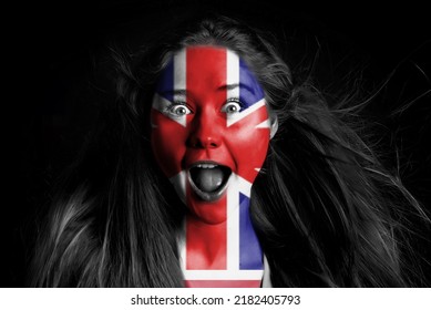 A Girl With A British Flag On Her Face Is Shouting At The Camera On A Black Background