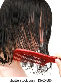 Girl Brushing Her Wet Hair