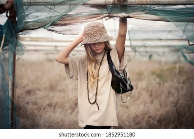 Girl With Bucket Hat And Fanny Pack.