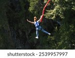 Girl bungee jumping in Whistler.