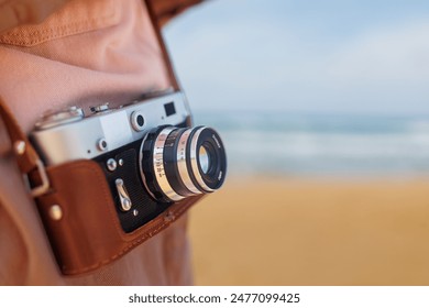 girl with a camera. female traveler with a backpack and a camera. adventure and travel. - Powered by Shutterstock