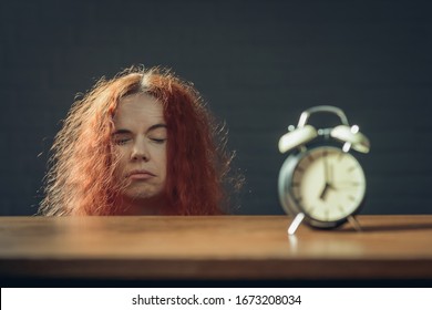 Girl can't wake up early in the morning - Shutterstock ID 1673208034