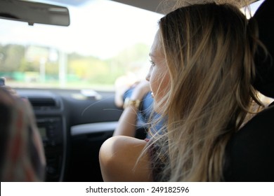 Girl In The Car On The Passenger Seat