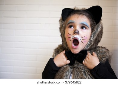 Girl With A Cat Costume In Halloween