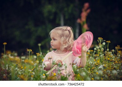 girl catches butterflies