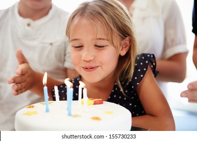 Girl Celebrating Birthday With Cake