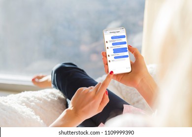 Girl chatting with friend on mobile phone.