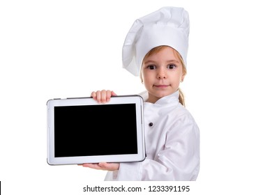 Girl Chef White Uniform Isolated On White Background. Showing The Empty Black Ipad Screen, Looking At The Camera. Landscape Image