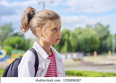 Girl Child Blonde 9, 10 Years Old In Profile, Head Closeup, Sky In Clouds Background, Copy Space