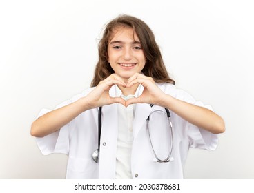 Girl Child Doctor Costume,
Doing The Heart Sign. White Background.