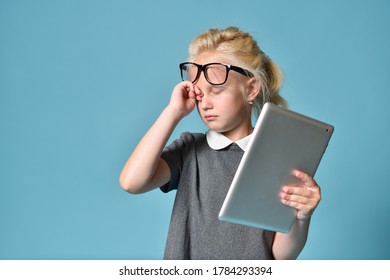 Girl Child In Glasses, Played Tablet Computer Until Late And Wants To Sleep.