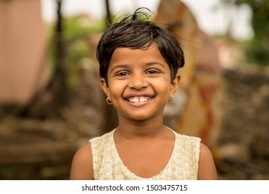 Girl Child Posing For The Camera  Marathwada Region Satara District Of Maharashtra State India
Clicked On 6 July 2018