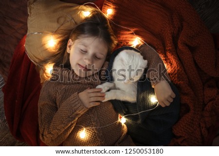 Similar – Newborn baby with pompom hat sleeping on blanket