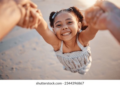 Girl child, swing and pov at beach, portrait and smile for game, holding hands or speed in summer. Young female kid, parent and spin in air, sand or happy for family bonding, love or care in sunshine - Powered by Shutterstock