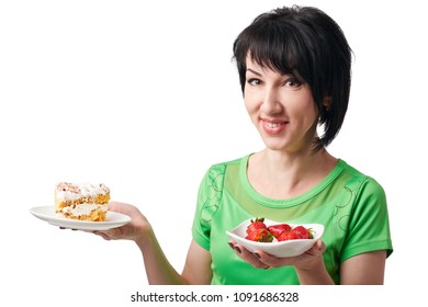 girl choice between strawberry and sweet cake, isolate on white background, healthy food concept