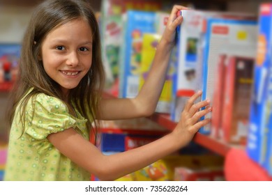 Girl Choosing Book