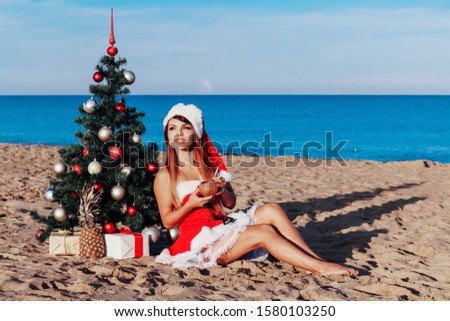 girl Christmas at a resort in the South by the sea