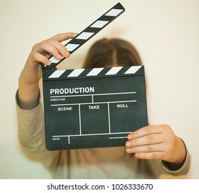 Girl With Clapper Board