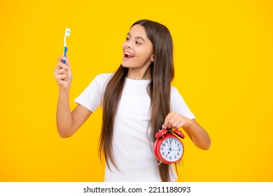 Girl Cleaning Teeth. Kid Brushing Teeth With Brush. Dental Hygiene, Tooth Care. Girl Cares About Health Of His Teeth. Time To Brushing Teeth. Clock Alarm Fork Daily Routine.