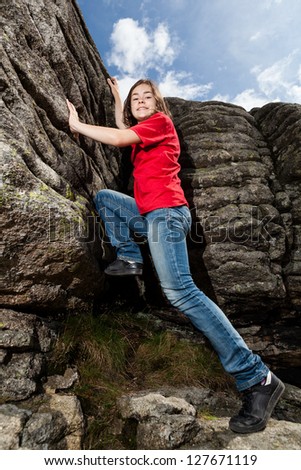 Similar – Wanderin steht auf einem Felsen am Old Man of Storr