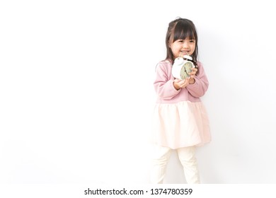 Girl with clock - Shutterstock ID 1374780359