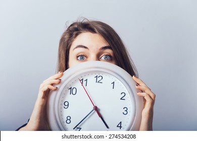 Girl With The Clock