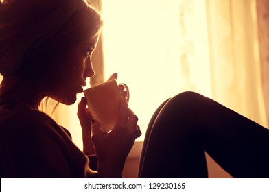 Girl And Coffee In The Morning