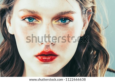 Girl with color makeup hipster fashion face portrait