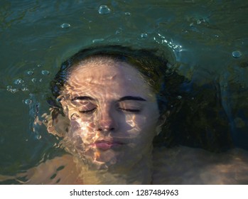 Girl Coming Out Of The Water