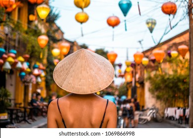 Girl With Conical Hat In Hoi An, Vietnam