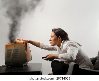 Girl Controlling An Old Broken Tv