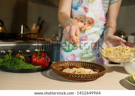 Girl cook cooks delicious tortilla pork and fresh vegetables