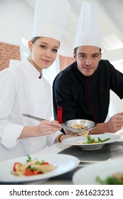 Girl In Cooking Training Class With Chef